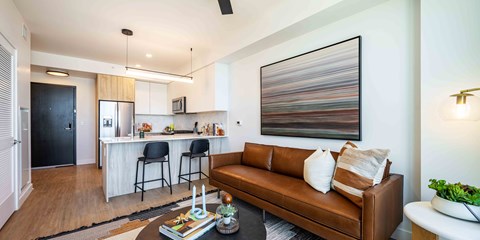 a living room with a couch and a table