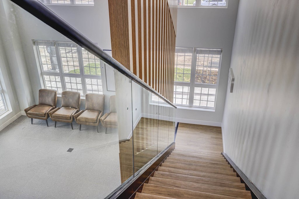 A view of the stairway leading down to a lobby area