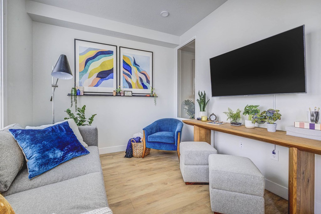 a living room with a couch and a tv