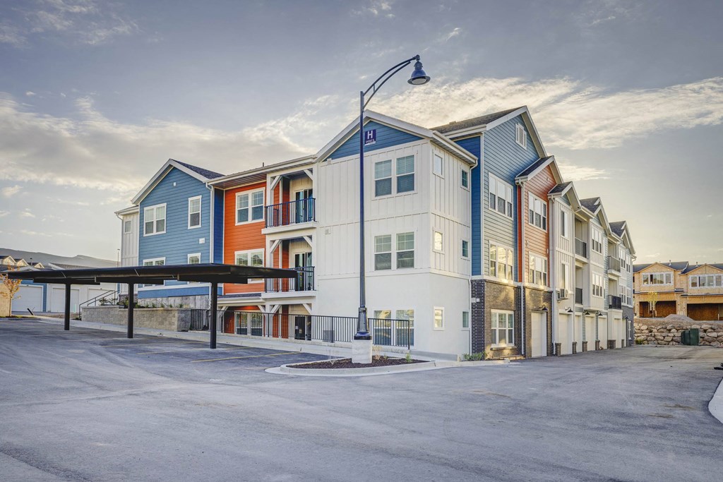 exterior view at dusk at the bradley braddock road station apartments