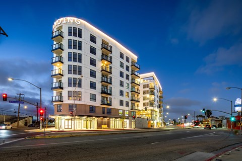 A street view of a building with the name "HUDSON" on it.