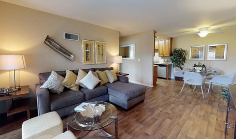 a living room with a couch and a table
