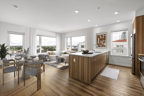A modern kitchen with wooden cabinets and a dining table with chairs.