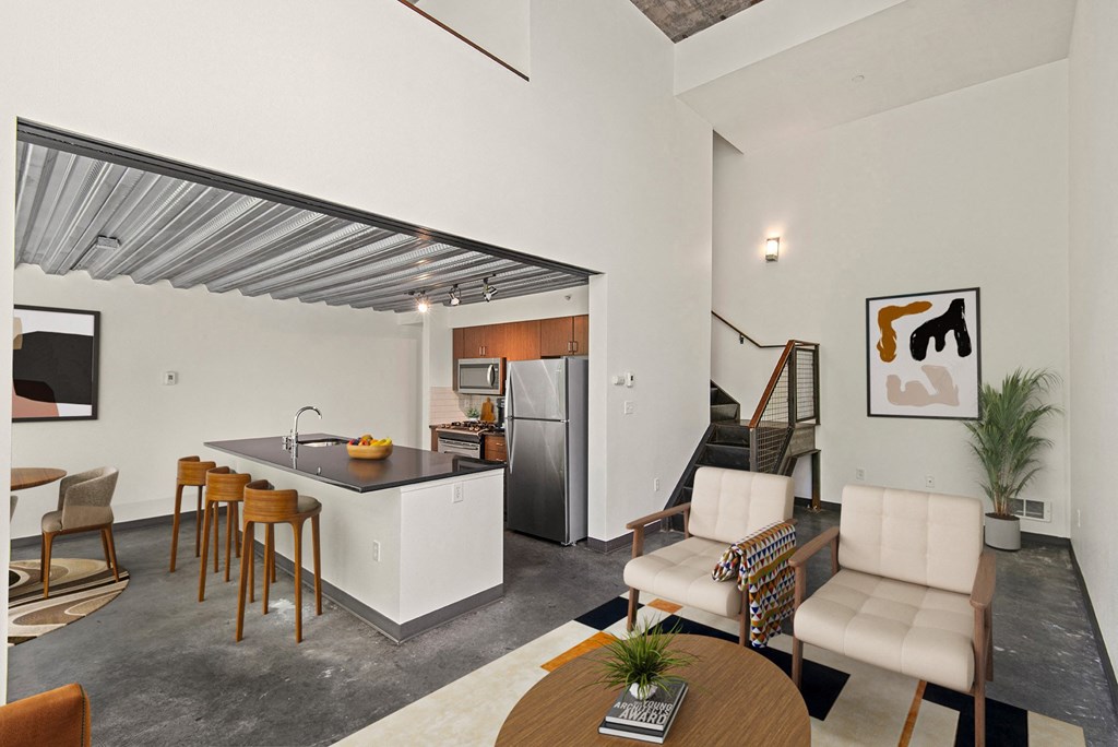 Living room with a kitchen and a dining room