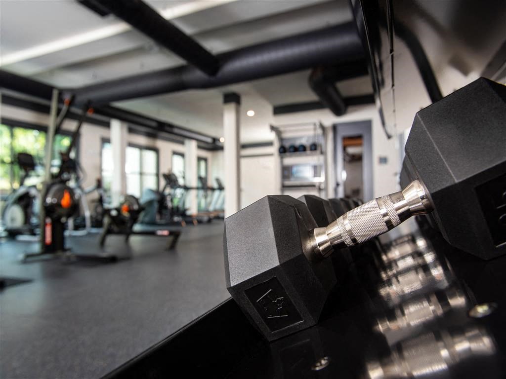 a dumbbell on a counter in a gym