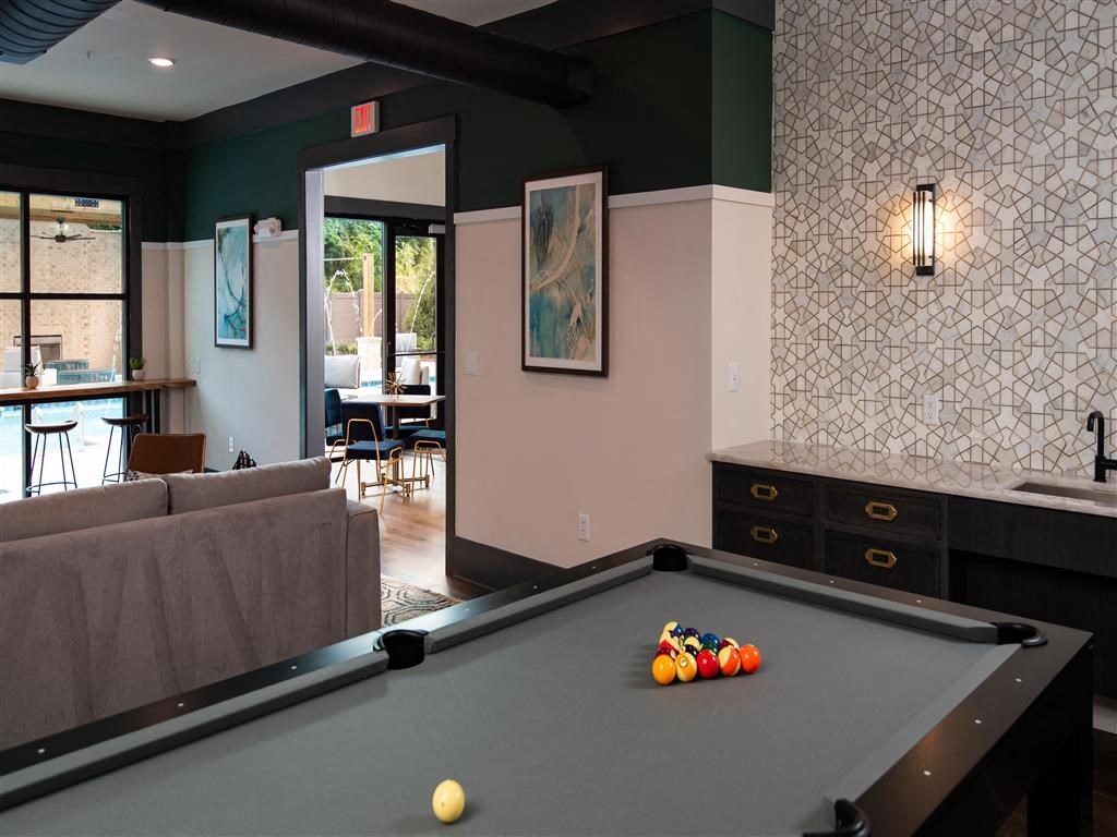 a pool table in a living room
