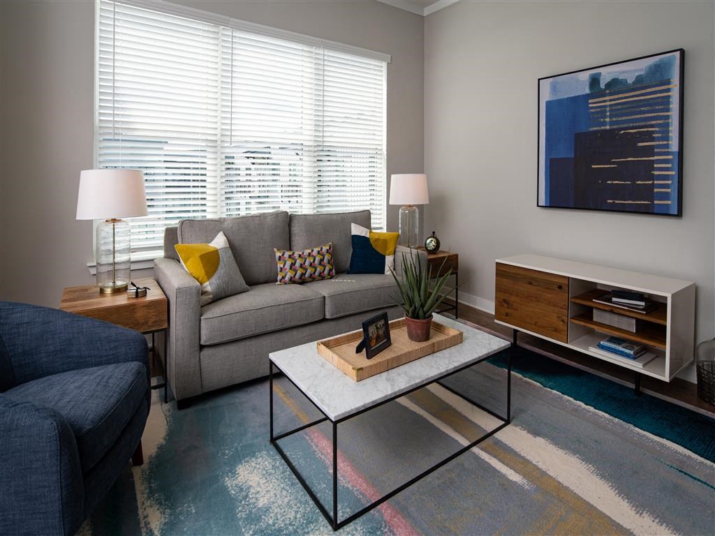 a living room with a couch and a coffee table