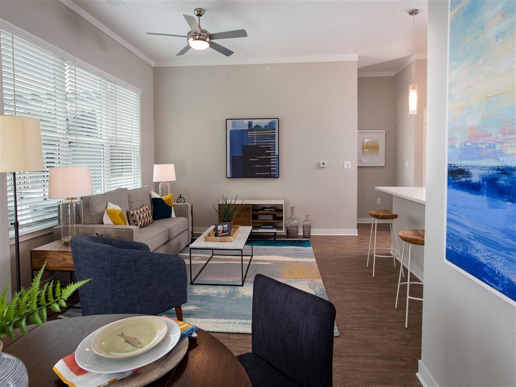 a living room with a couch and a table