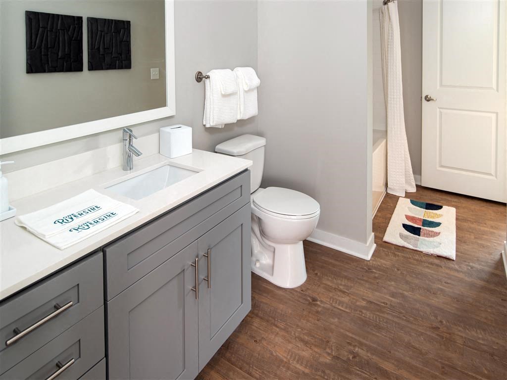 a bathroom with a toilet and a sink