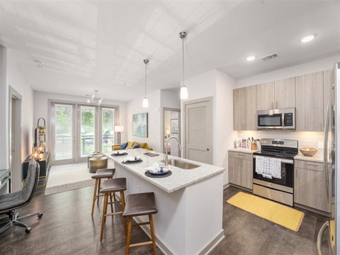 a kitchen with a counter top and a sink