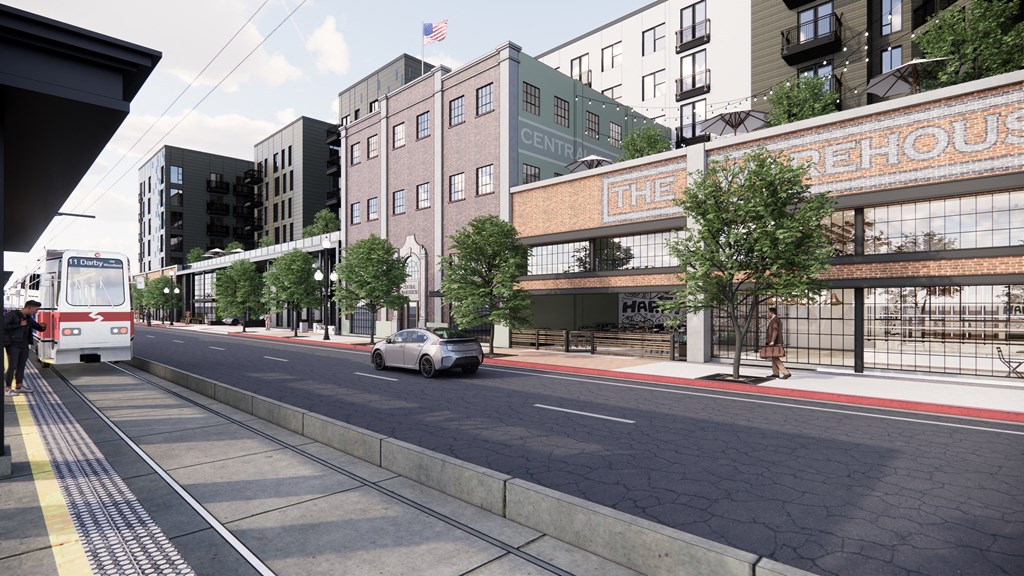 a rendering of a city street with buildings and a bus