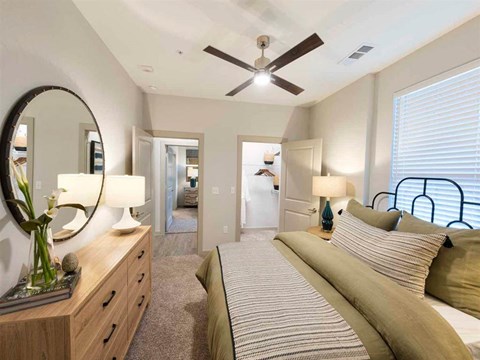 Beautiful bedroom with bed at The Pointe at Valley Ranch Town Center, New Caney, TX, 77357