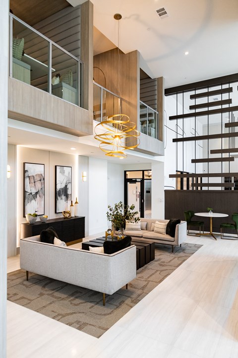 a living room with a couch and a table