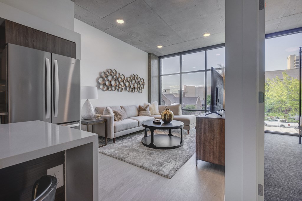 Living room with large window and beautiful decor