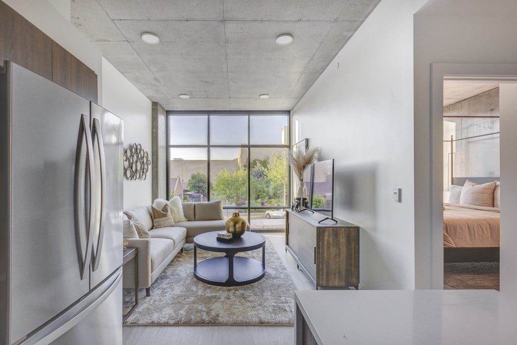 Living area with floor to ceiling windows