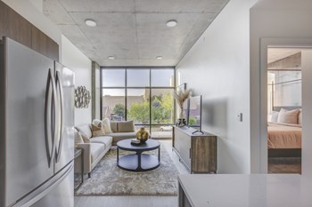Living area with floor to ceiling windows - Photo Gallery 9