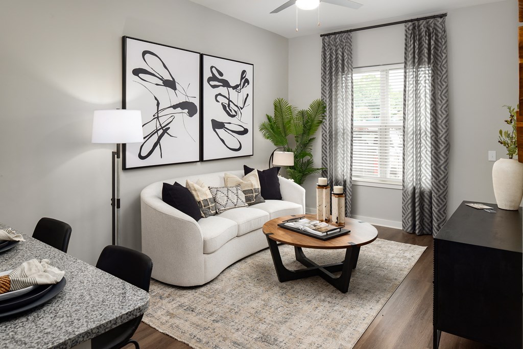 a living room with a couch and a table