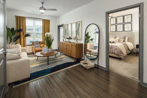 Living room with a mirror at The Dorsey by Alta, Georgia, 30180