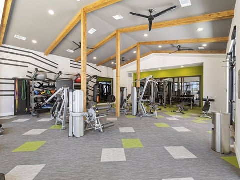 the gym at the flats at big tex apartments