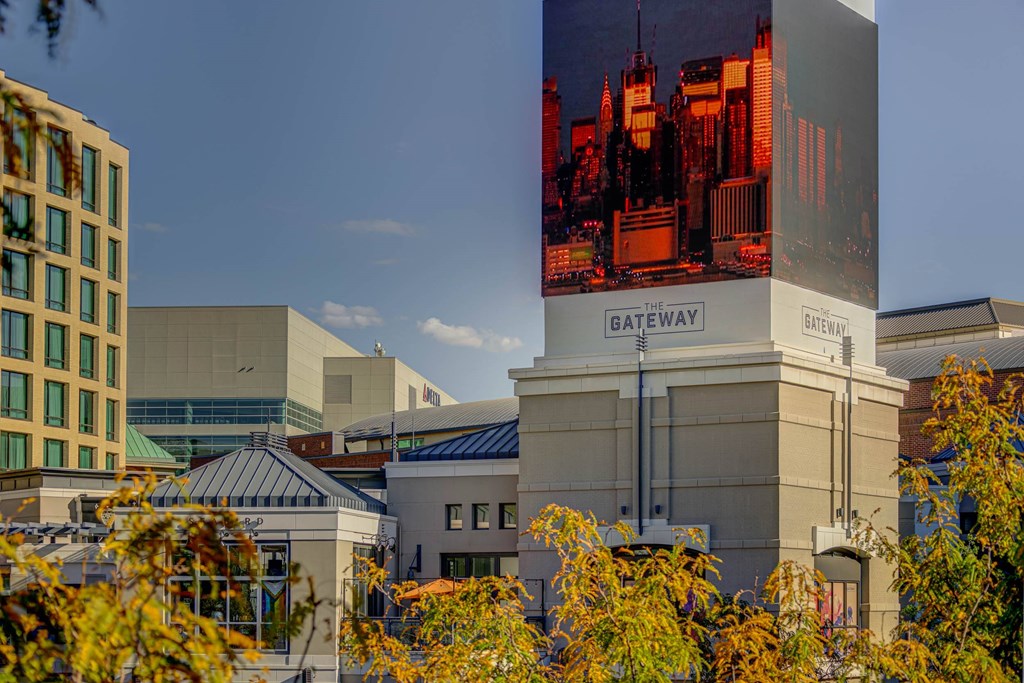 A building with a large advertisement on the side of it.