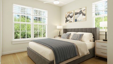 A bedroom with a large bed and a window with blinds.