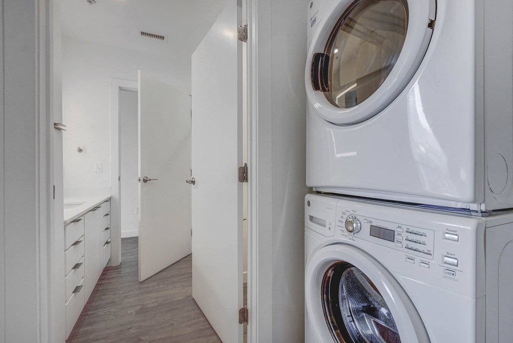 Full sized stacked front loading washer and dryer