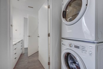 Full sized stacked front loading washer and dryer - Photo Gallery 16