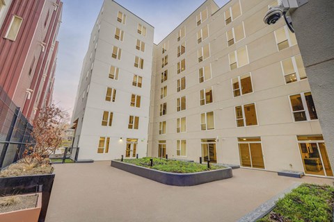 A modern building with a courtyard in the center.