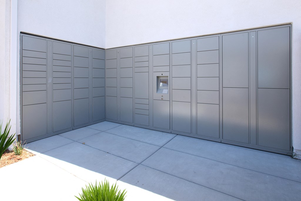 a large garage with steel doors and a cement floor