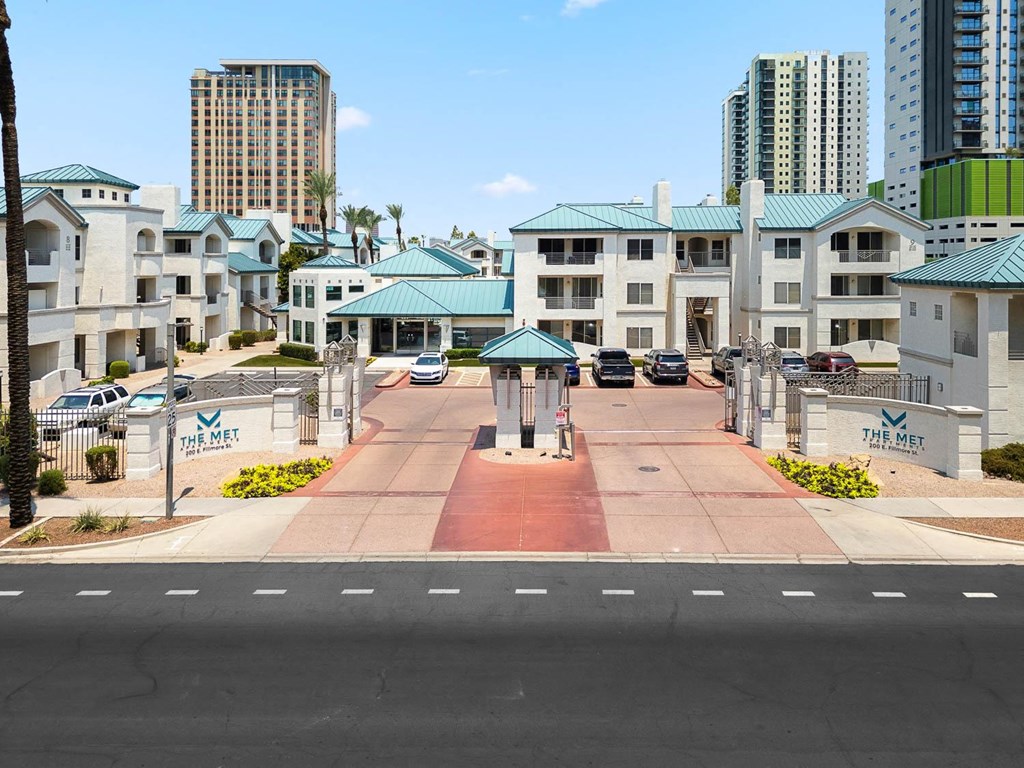 Exterior monument sign of building name, entrance of the community