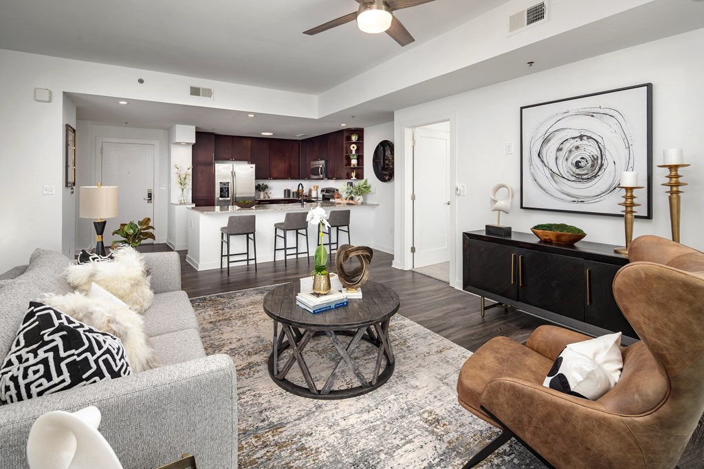 a living room with couches and a table