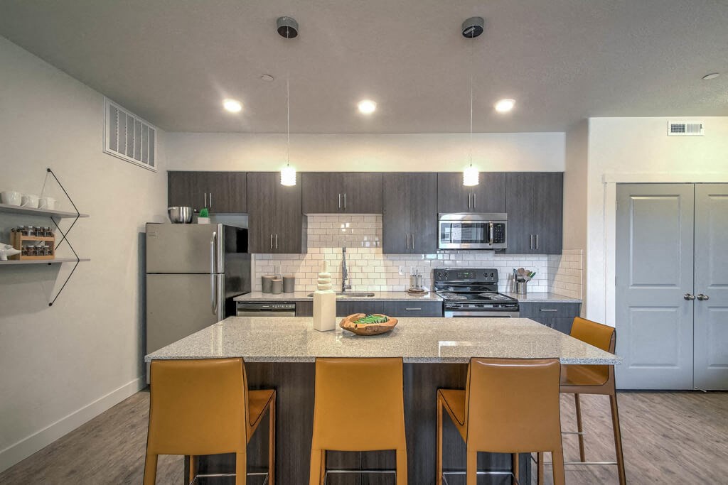 furnished model island and kitchen