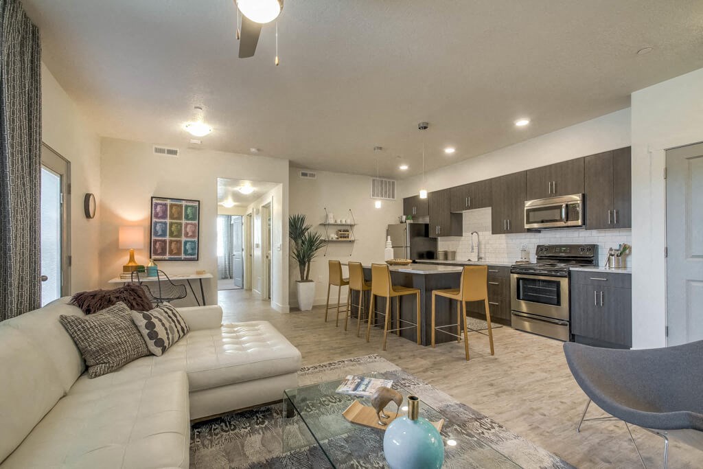 furnished model living room and kitchen