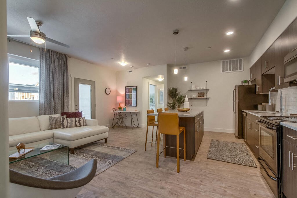 furnished model living room and kitchen