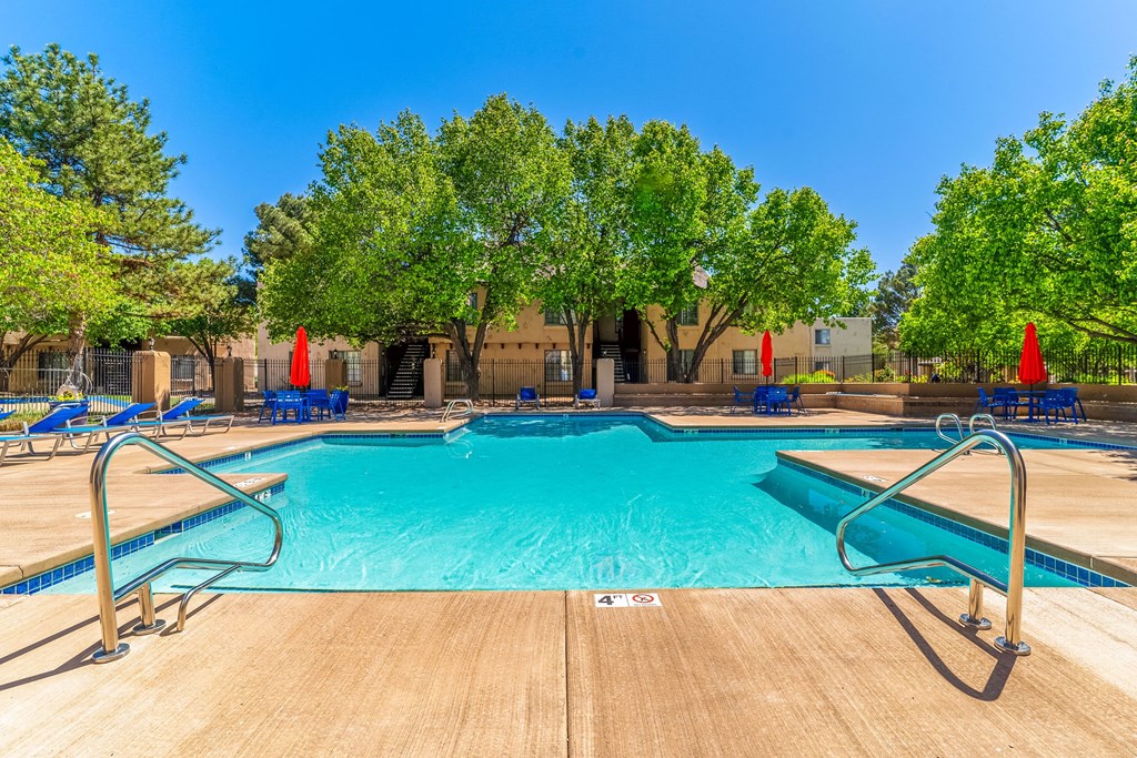 our apartments have a resort style pool with trees