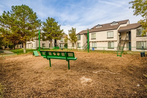 the preserve at ballantyne commons park bench in front of apartment buildings