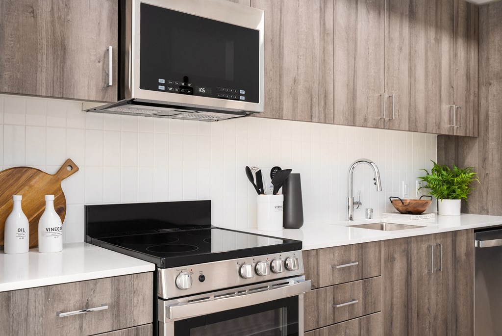a kitchen with a stove and a sink