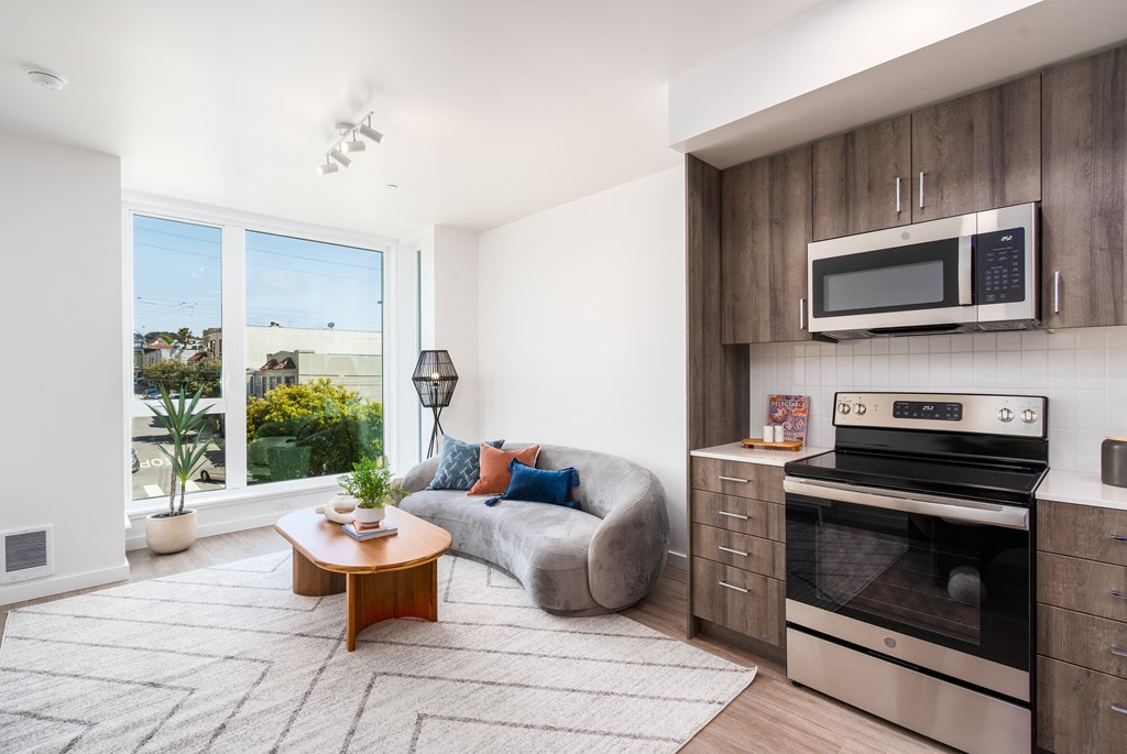 a kitchen and living room