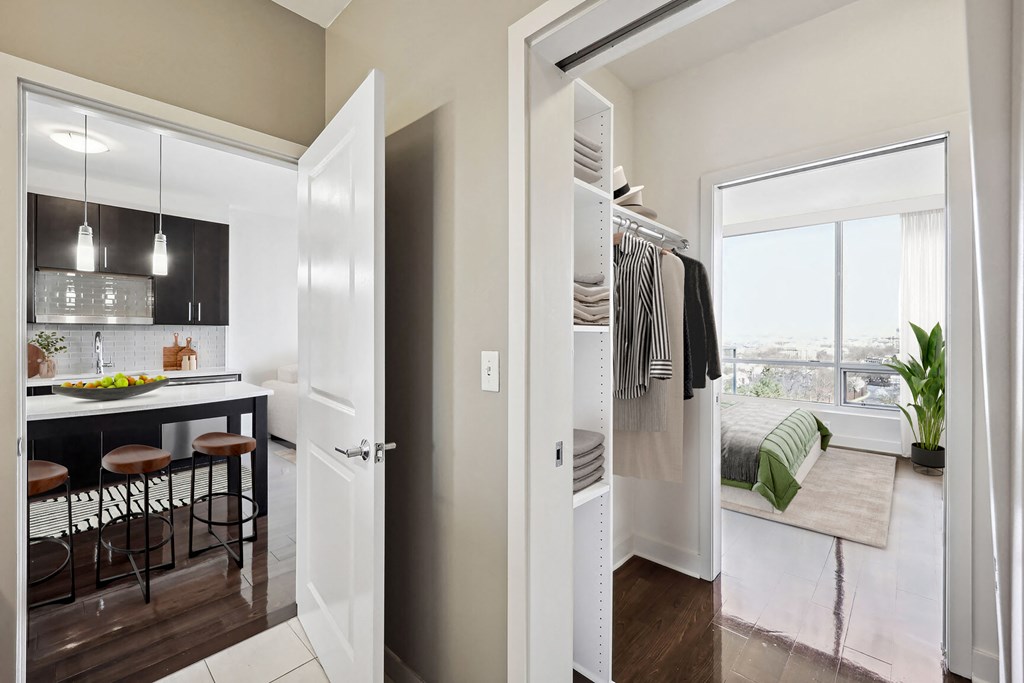 a walk in closet in a 555 waverly unit