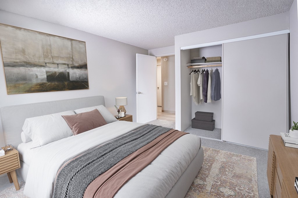Bedroom with a bed and a closet at Veri at Timberhill, 97330