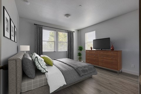 a bedroom with a bed and a dresser