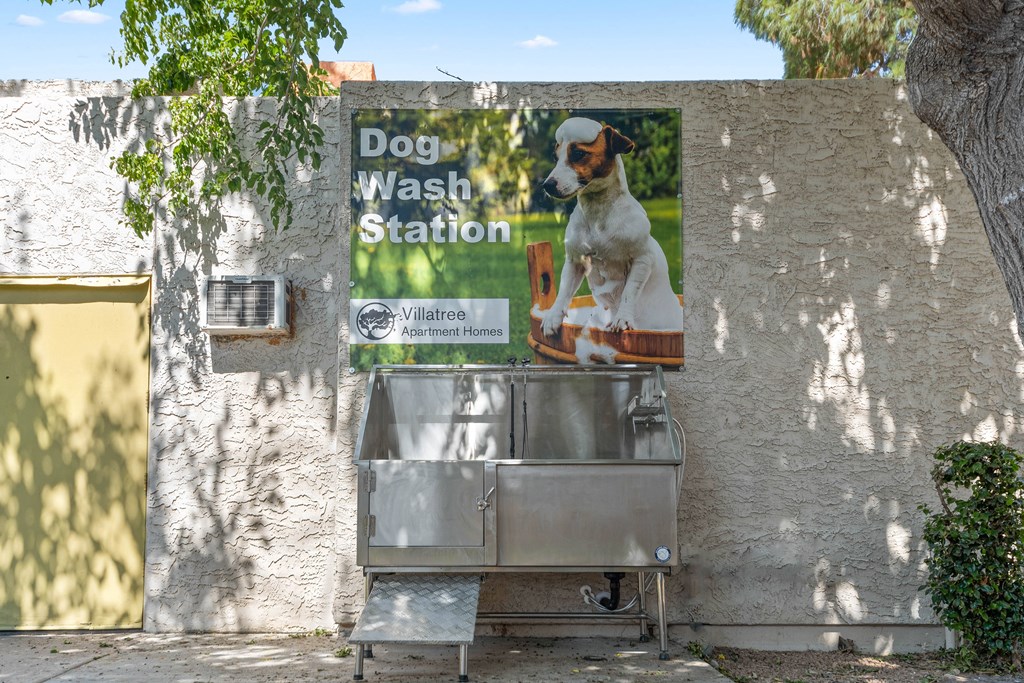 a sign for the dog wash station