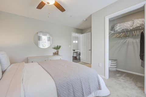 Bedroom with large closet and ceiling fan  at Vista Commons Apartments, Columbia