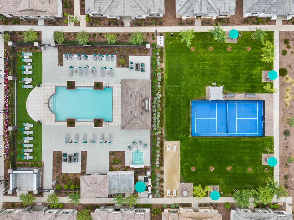 arial view of the resort with a pool and lawn