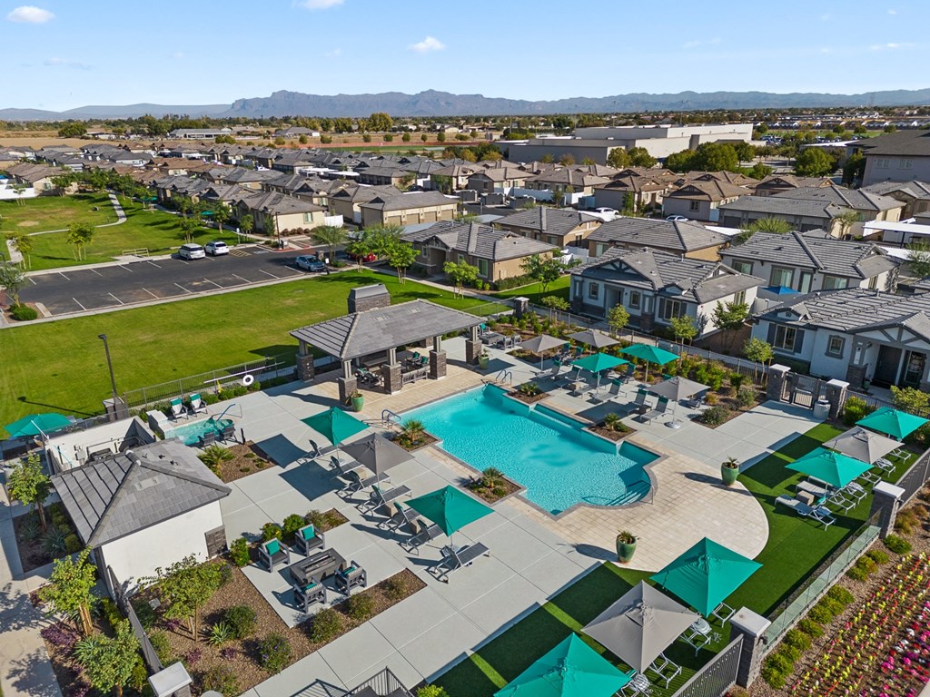 Outdoor resort-style pool with lounge seating