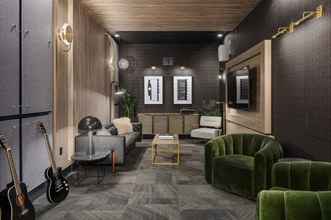 a living room with guitars and couches