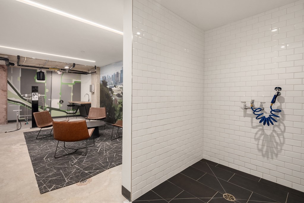 a meeting room with  a table and chairs and a blue anchor on the wall