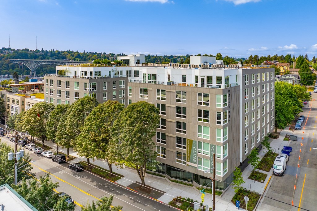 an  aerial view of a large building on a city street