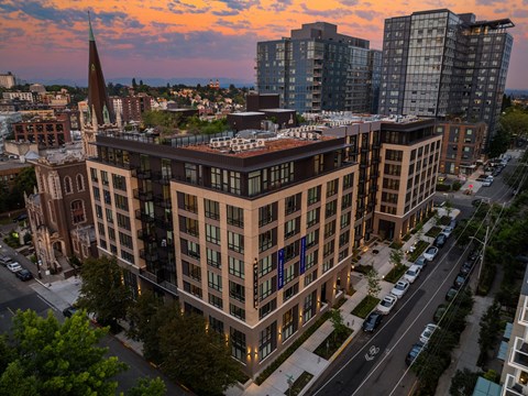 an aerial view of a building in the city