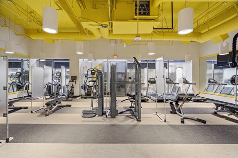 Gym with cardio and weights at Wilshire Vermont, Los Angeles, California